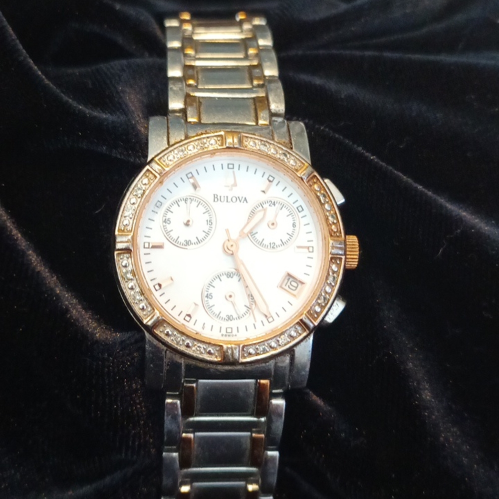 Bulova rose gold tone/stainless steel watch